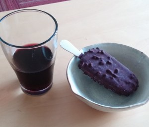 This is the Red Wine and Ice Cream food group. Vintage 2008 Rioja on the left, Magnum Infinity bar on the right (finest ice cream bar on earth).